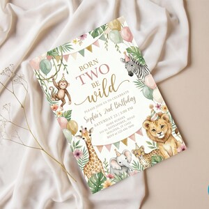 May include: A rectangular birthday invitation card featuring watercolor illustrations of a monkey, zebra, giraffe, elephant, leopard, and lion wearing party hats, surrounded by balloons, leaves, and flowers, with the text BORN TWO BE WILD.