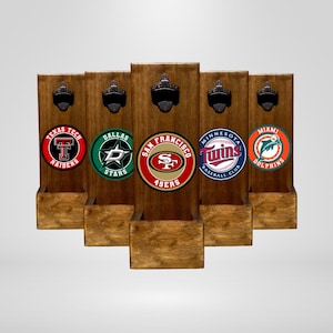 May include: Five wooden bottle openers with different sports team logos. The logos are for the Texas Tech Raiders, Dallas Stars, San Francisco 49ers, Minnesota Twins, and Miami Dolphins.