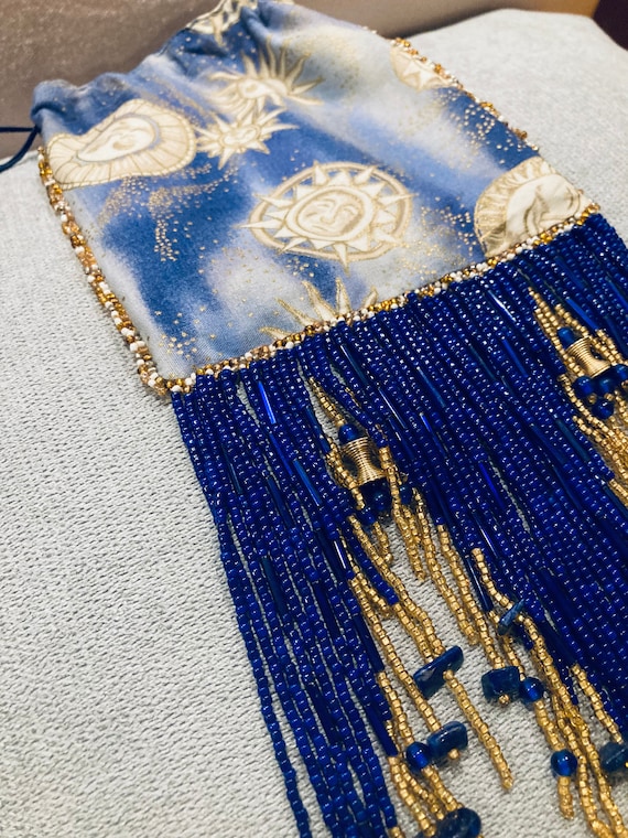 Blue and gold beaded purse.