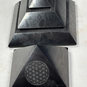 Shungite pyramid, highly polished, either with a Saqqara or Flower of Life design, best quality, Shunga River, Karelia, Russia, healing stone decoration