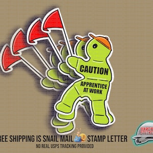 May include: A green cartoon character wearing a hard hat and holding a red flag. The character is labeled "Caution Apprentice at Work".