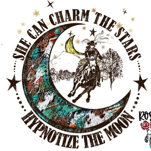 May include: A brown and gold graphic design with a crescent moon, stars, and a cowgirl riding a horse. The text reads "She can charm the stars... hypnotize the moon." and "rosamy designs original".