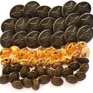 May include: A collection of 50 vintage military buttons. The buttons are made of metal and feature a star design. There are two different colours: gold and green.
