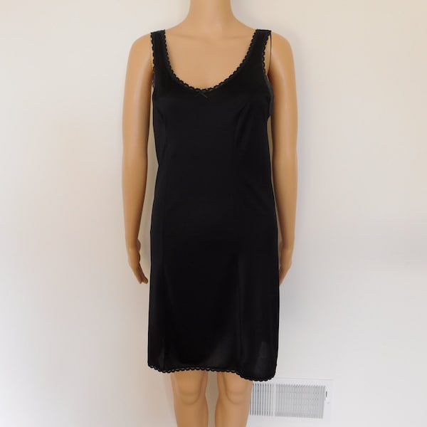 Slip dress-trending now-vintage 70's black full slip-wear as a slip dress or nightgown-soft, clingy material-Size 34 with some stretch