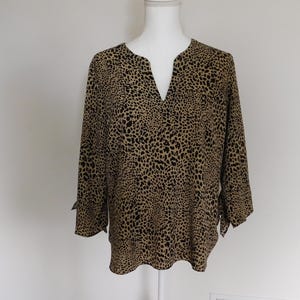 Michael Kors Large leopard print blouse-Trending now-crepe like lightweight fabric but long sleeves that tie at the cuffs-New without tags