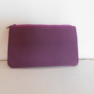 Cosmetic bag-accessory bag-make-up bag-purple-vinyl inside and out-zipper at top- 4 1/2 X 7 1/4-new-never used-