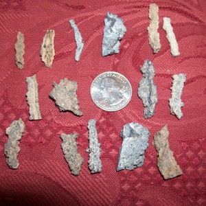 1 real Fulgurite Petrified Lightning per lot. Are created when lightning strikes sand.