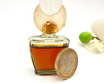 Mini perfume vintage: Uninhibited Cher Parfum 0.13 fl oz. Regalo coleccionable, sin caja.