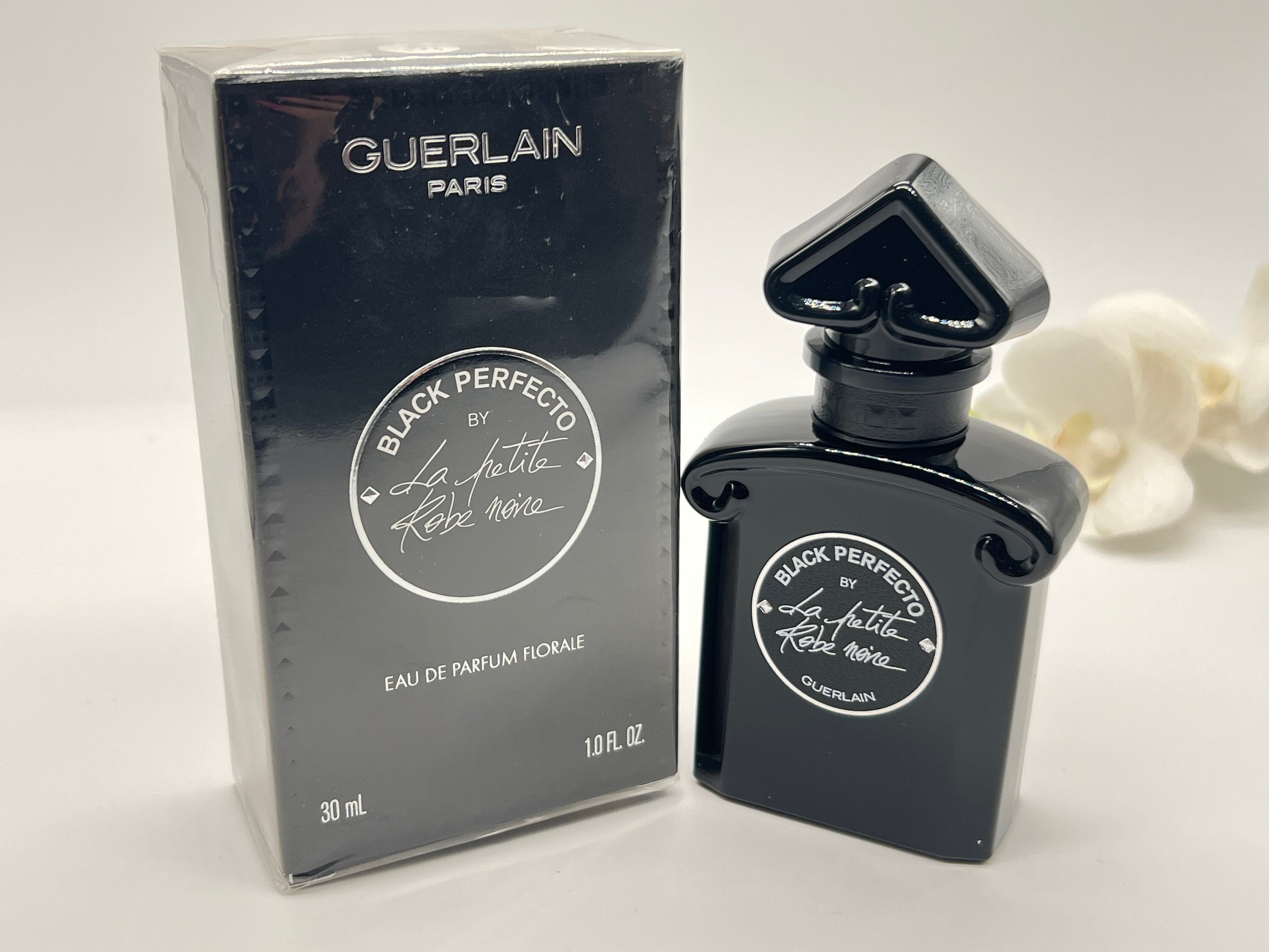 Petit vaporisateur de parfum vintage noir et rose