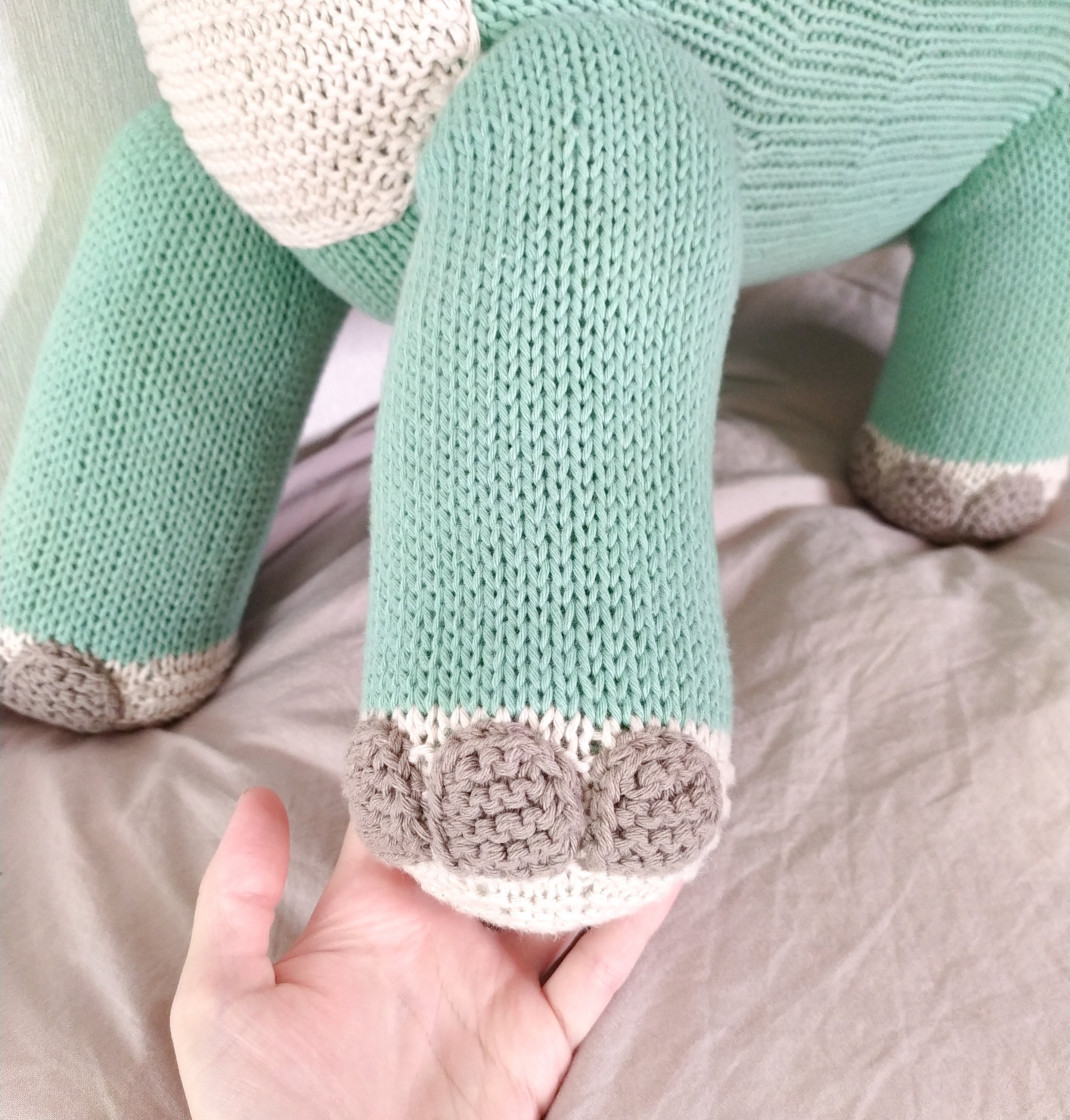 large knitted dinosaur