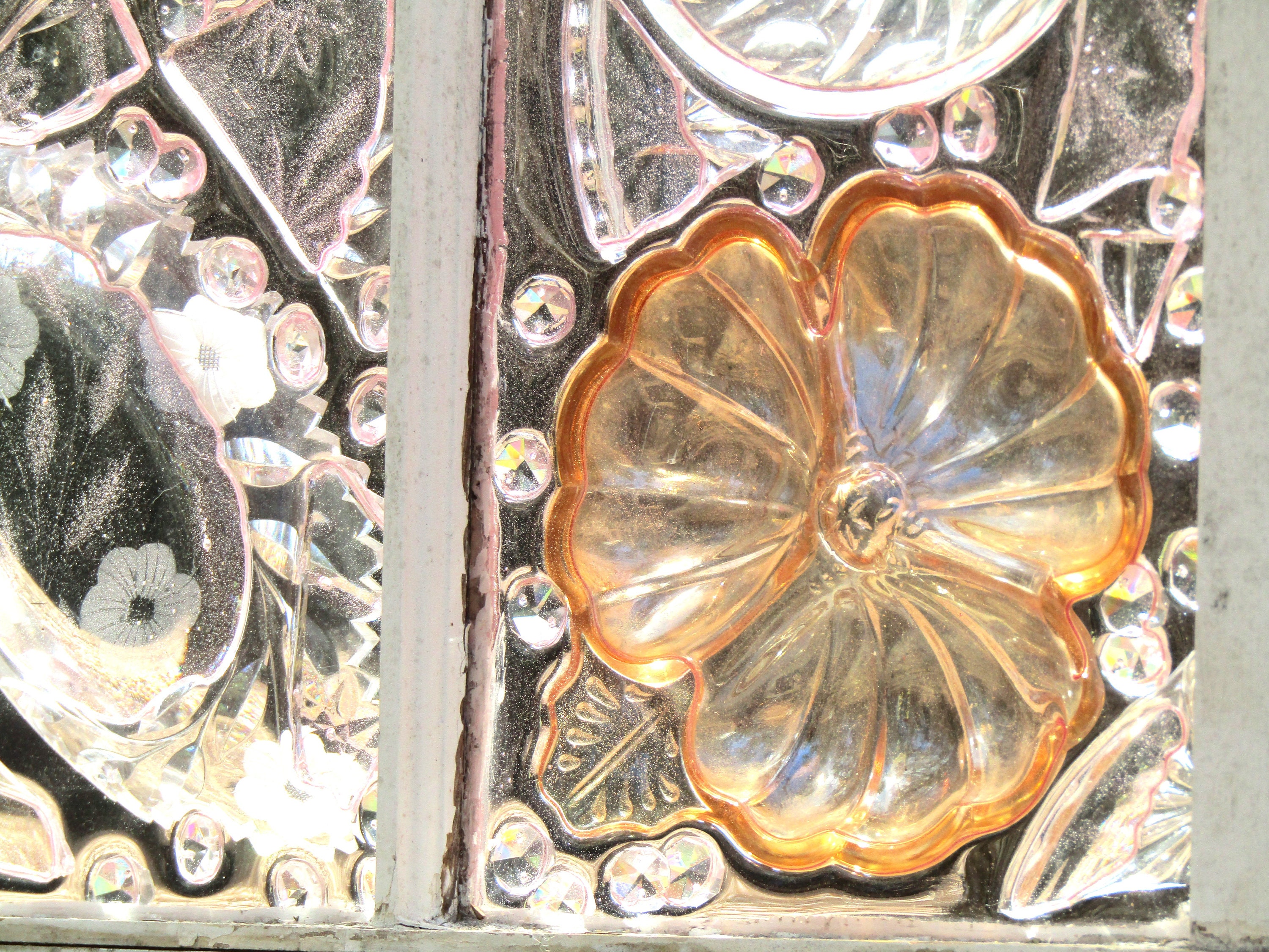 Suncatcher With Vintage Glassware Featuring Various Pieces of