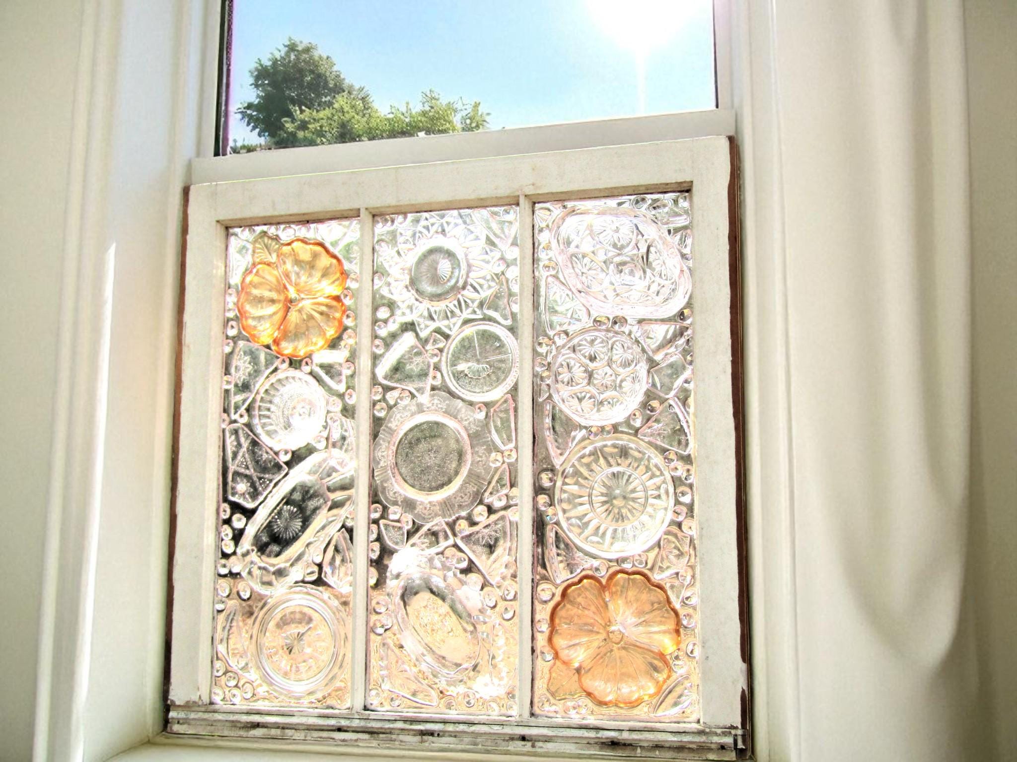 Suncatcher With Vintage Glassware Featuring Various Pieces of