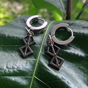 Berserk earrings best sale