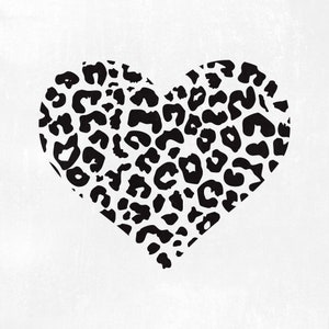 Pode incluir: Um design em forma de coração preto e branco com um padrão de estampa de leopardo.