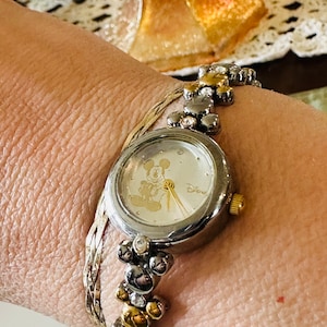 Disney Mickey Mouse Face Analog Watch With Silver And Gold Tone Mickey Head Clear Rhinestones Water Proof Needs New Battery Replaced