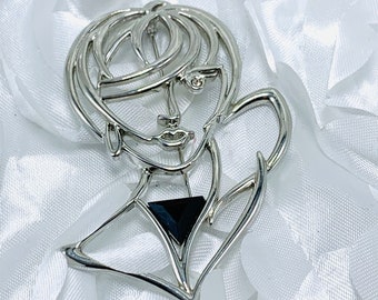 Silver Mod Brooch J.J. signed Silver Tone And Black Onyx Inlay Modernist Lady Brooch 1988 With Rhinestone Eye