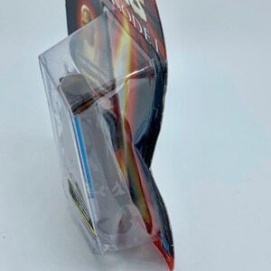 May include: A plastic-wrapped action figure of a Star Wars character, Darth Maul, from Episode I. The figure is in a black and red box with the words "Episode I" on the front.