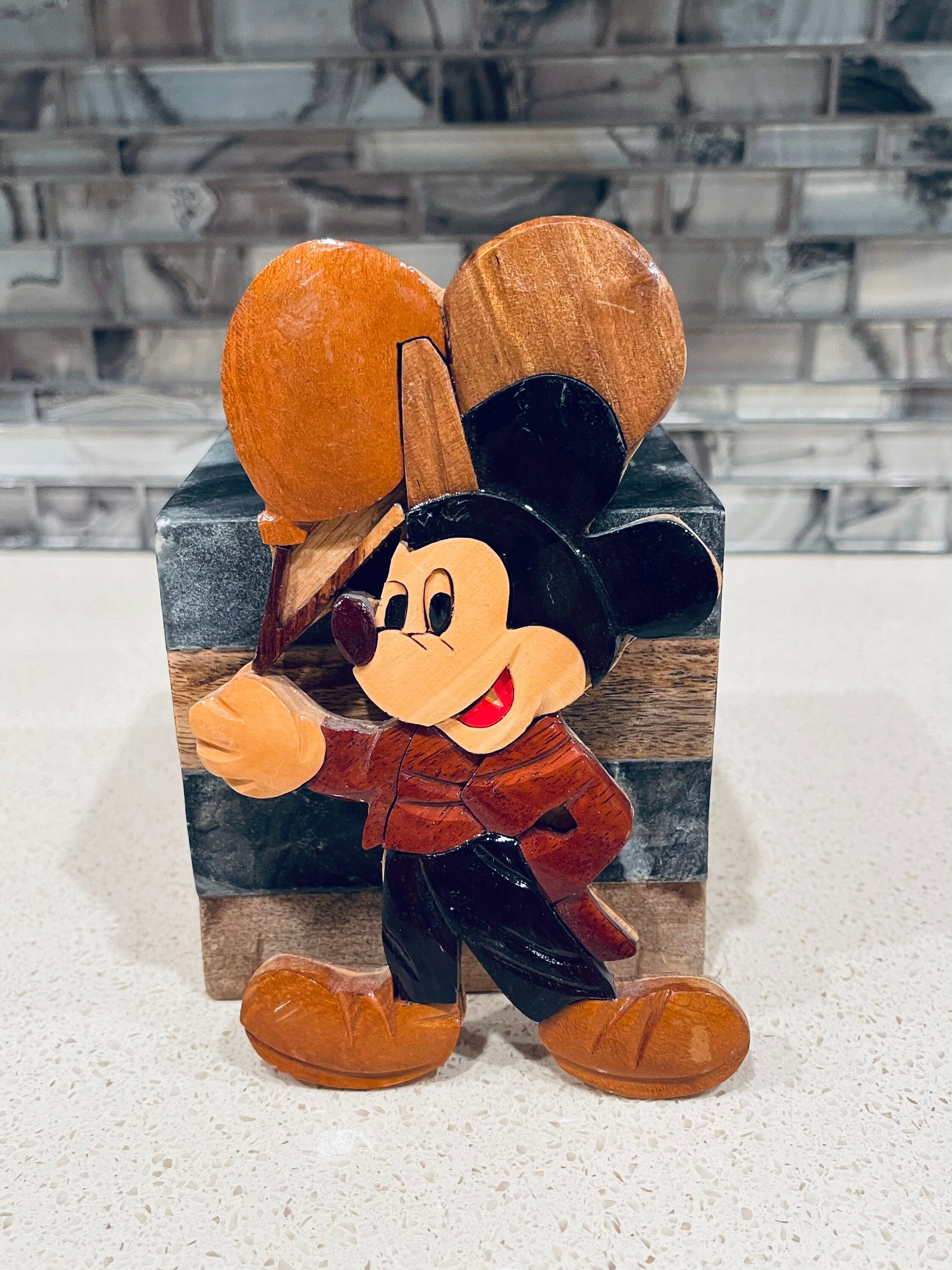 large wooden mickey mouse statue