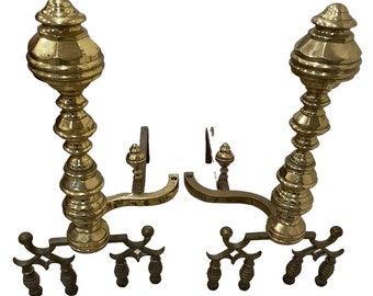 A pair of early 19th century antique brass andirons in good condition. Made in USA