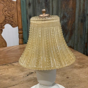 Art Deco Light Fixture with a beaded swirl pattern