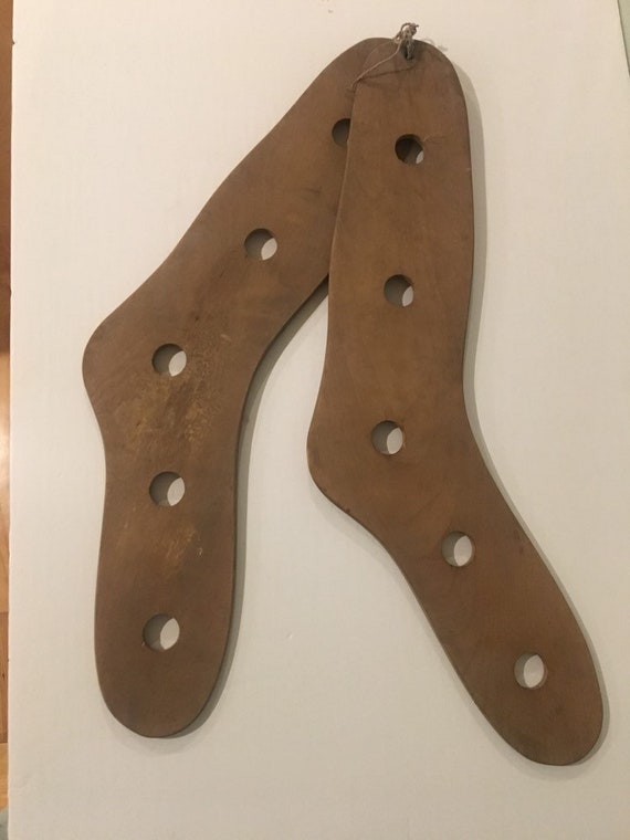 interesting vintage pair of wooden sock stretchers or airs.