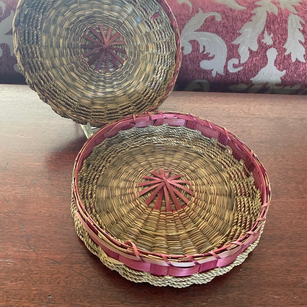 A rare round vintage ash strip basket covered with sweet grass and twine.