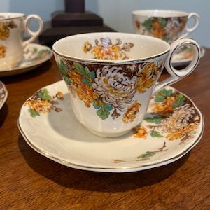 4 Grindley, England Creampetal cups and saucers