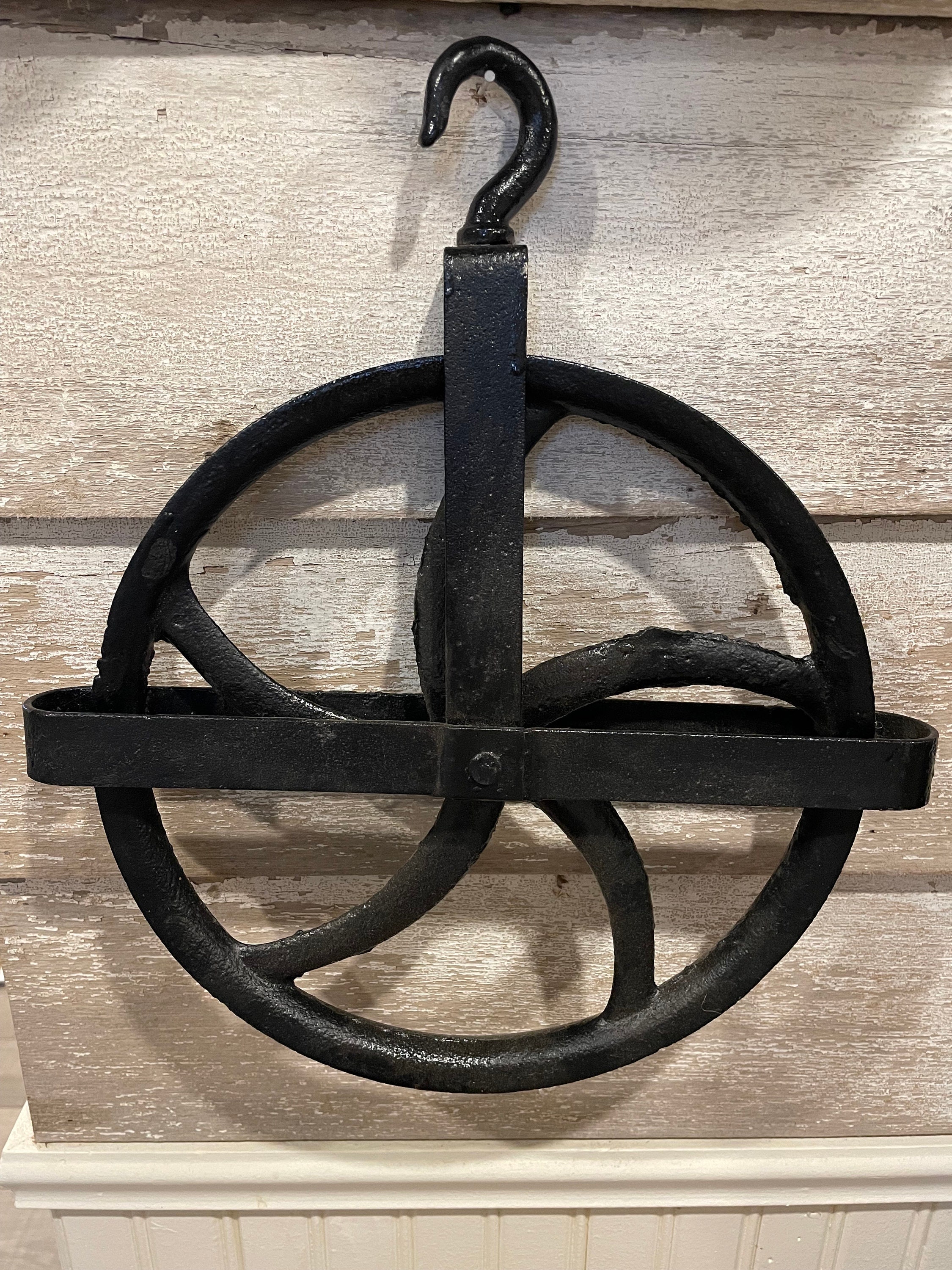 Antique well pulley in nice restored condition and black paint.