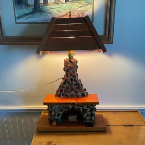 Vintage prison folk art  stone  fireplace lamp with wooden  shade