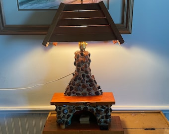 Vintage prison folk art  stone  fireplace lamp with wooden  shade