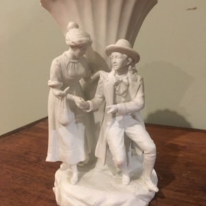 Beautiful 1850&#39;s German white bisque figure of a man and a woman by a tree.
