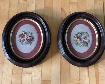 A wonderful pair of early pine antique oval shadow box picture frames from the 1800's with updated matting and needle point.