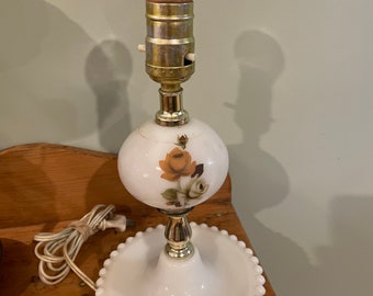 1970's electric milk glass table lamp with painted roses.