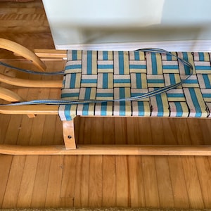 Vintage handmade sleigh with woven seat from Switzerland