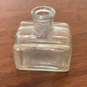 A unique antique ink bottle in good unwashed condition.