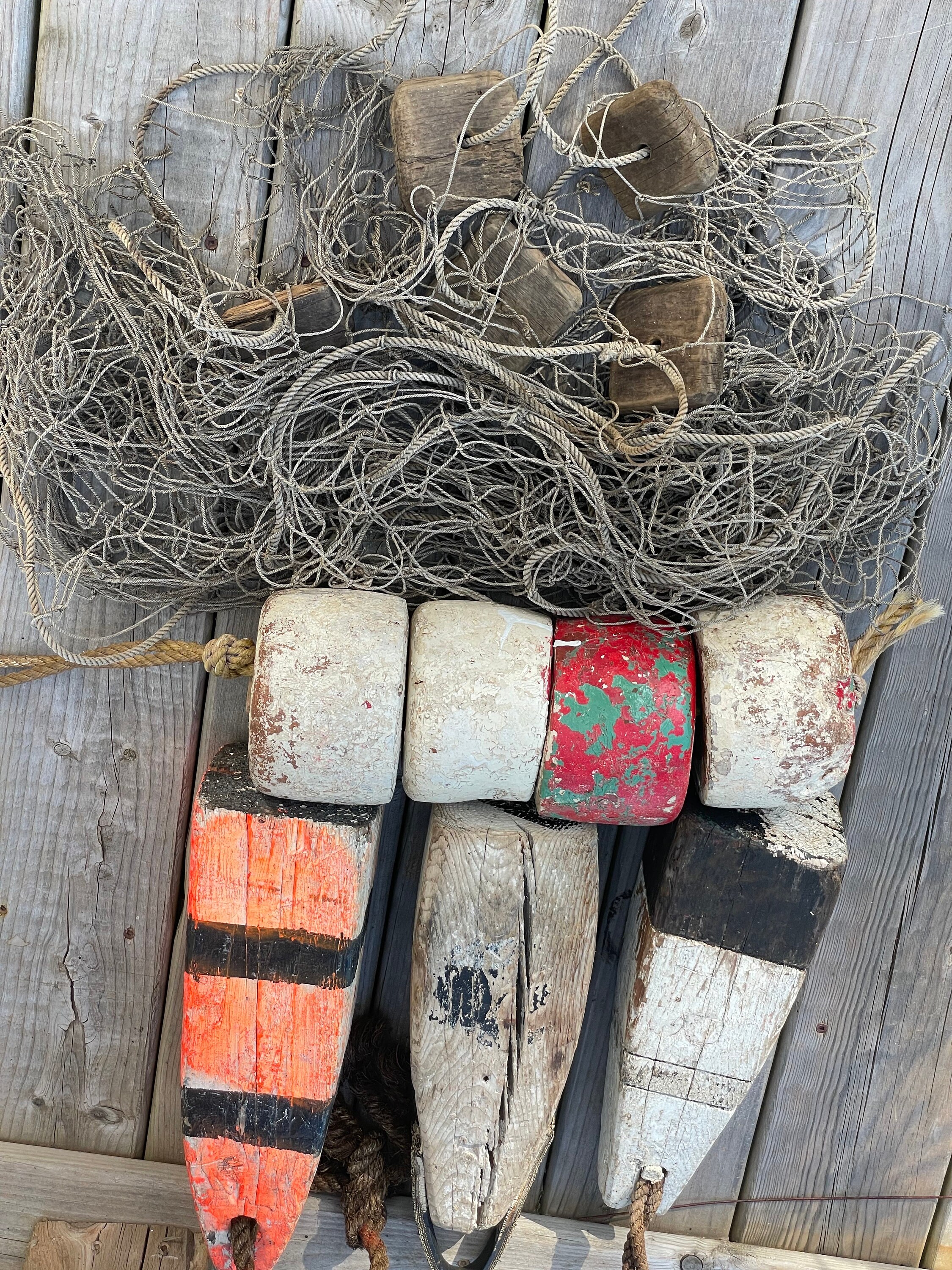 A Small Collection of Antique and Vintage Fishing Buoys, Netting and Floats  From Maritime Canada. 