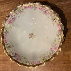 A beautiful open floral console dish with remarkable gold trim signed M Z Austria..