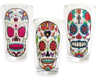Sugar Skull Drink Glass Tumbler with assorted sugar skull designs your drink color will fill the clear areas of each skull