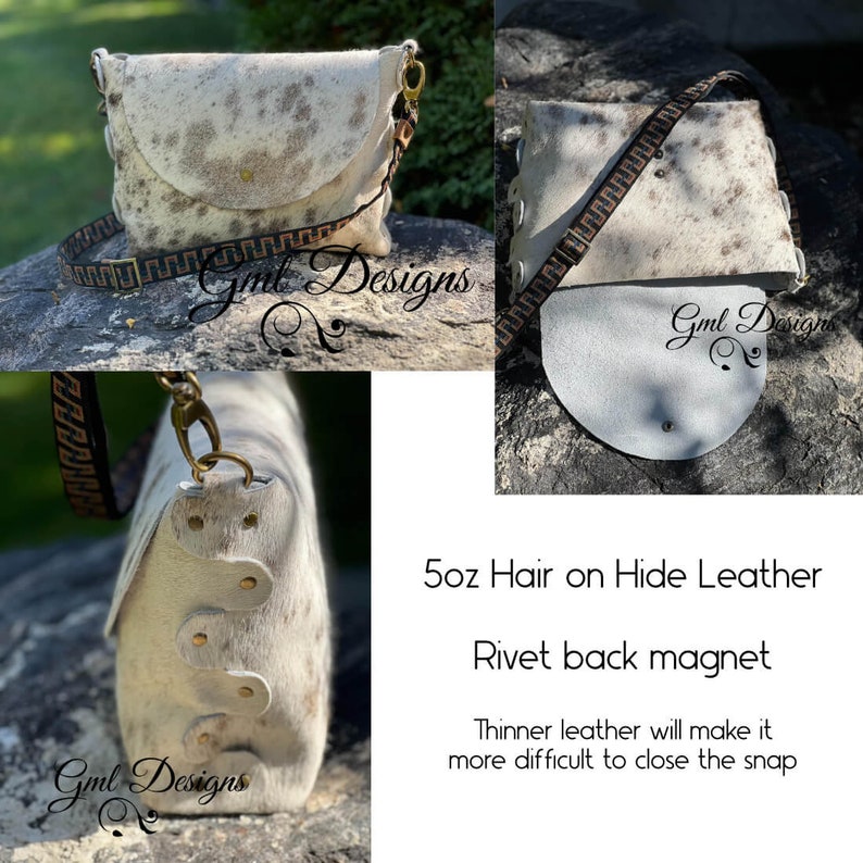 May include: A white and brown cowhide leather crossbody bag with a gold chain strap and a brown and white geometric patterned strap. The bag has a flap closure with a magnetic snap. The bag is made of 5oz hair on hide leather and has a rivet back magnet. "Gml Designs" is written on the bag.
