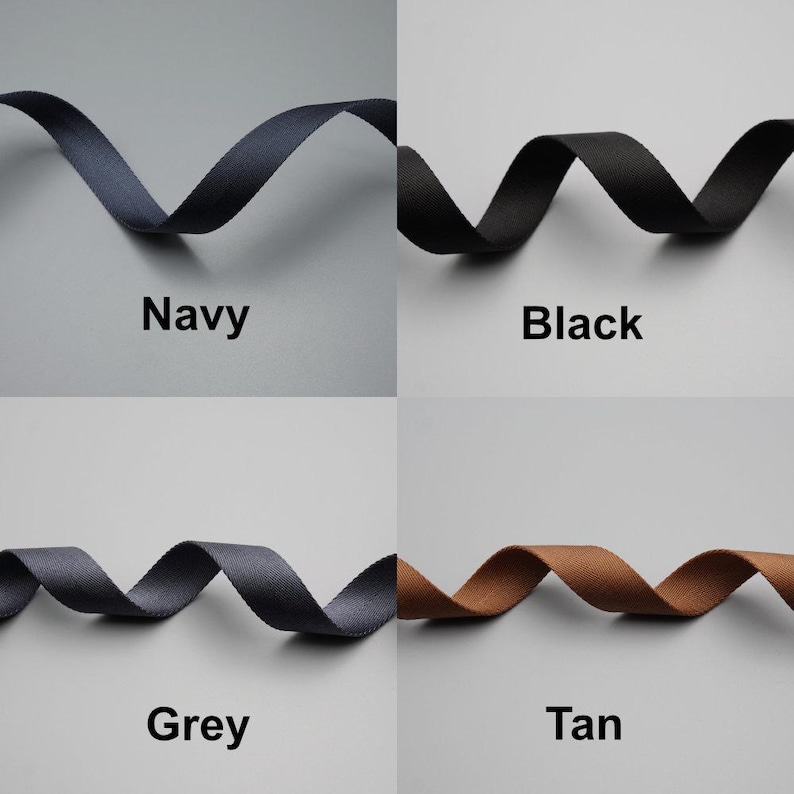 Peut inclure: Quatre &eacute;chantillons de ruban de couleurs marine, noir, gris et beige. Chaque ruban est ondul&eacute; et &eacute;tiquet&eacute; avec son nom de couleur. Le fond est gris uni.