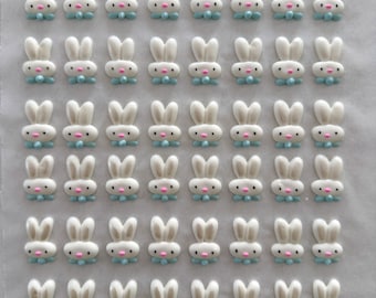 Decoración de glaseado real: OCHO conejitos con pajaritas azules