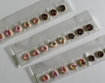 Royal Icing Decoration - EIGHT pcs. Doughnuts with Rainbow Sprinkles