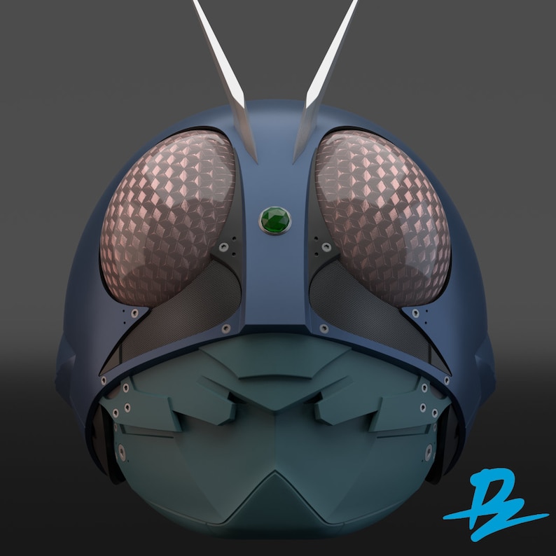 May include: A blue and green helmet with a geometric pattern on the front. The helmet has two large, round eyes with a green jewel in the center.