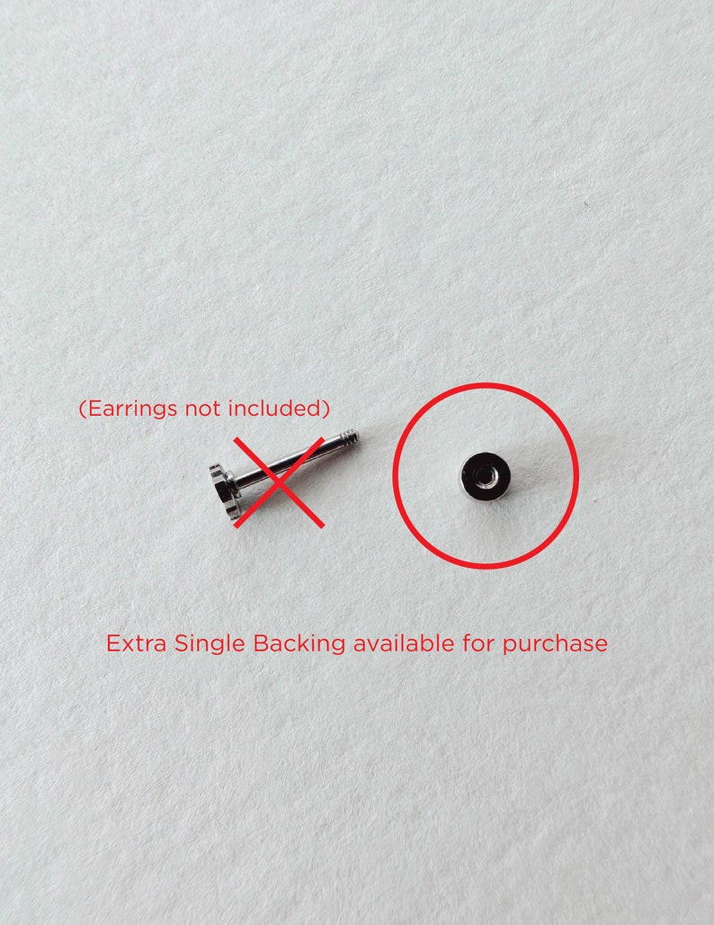 May include: A single silver earring backing. The backing is a small, round disc with a screw-on post. The text "(Earrings not included)" is written in red above the backing. The text "Extra Single Backing available for purchase" is written in red below the backing.
