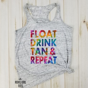 May include: A gray tank top with a rainbow-colored graphic that says "FLOAT DRINK TAN & REPEAT".