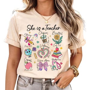 She is A Teacher (B) - Religious Teacher Shirt, Gift For Teacher, Inspirational Teacher Shirt, Teacher Appreciation Shirt, Christian Tee