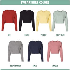 May include: A display of cropped sweatshirts in various colors, including red, black, yellow, dusty blue, deep heather, navy, and mauve. The text "SWEARSHIRT COLORS" is at the top of the image.