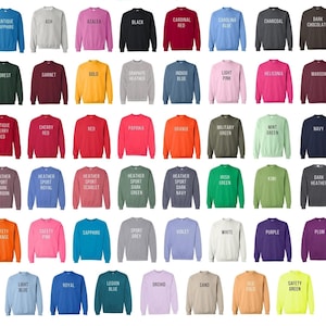 May include: A collection of crewneck sweatshirts in various colors, each labeled with its color name in white text. Colors include black, red, blue, green, pink, and more. The sweatshirts are displayed on a white background.