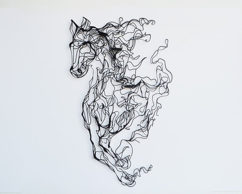 Durable steel horse wall hanging, finished with a sleek matte black powder coating, resistant to moisture and damp