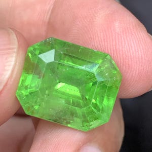 23 Carat Apple Green Peridot Gemstone: Emerald Cut for Custom Jewelry